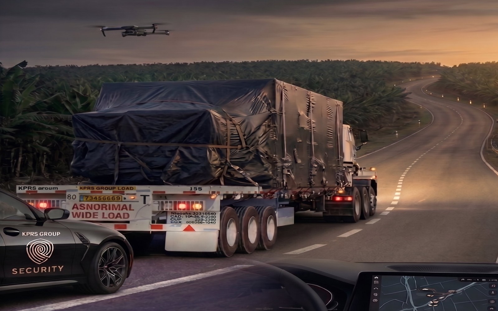 KPRS Group Security convoy escort with abnormal load truck, surveillance drone, and GPS tracking